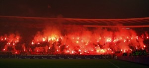 Red Star Belgrade's fans light flares during their Serbian Superleague soccer match against Partizan Belgrade in Belgrade