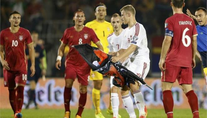 19707634_2014_10_14T222011Z_983491126_LR1EAAE1Q1DP5_RTRMADP_3_SOCCER_EURO_SERBIA_BRAWL.limghandler